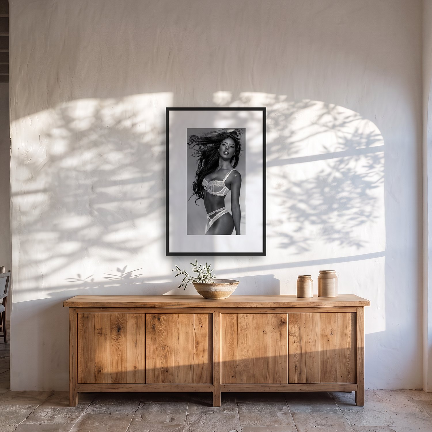 Es Trenc 2 Es Trenc – black & white fine art print by Marcus Boéll, framed, shown in a dining room