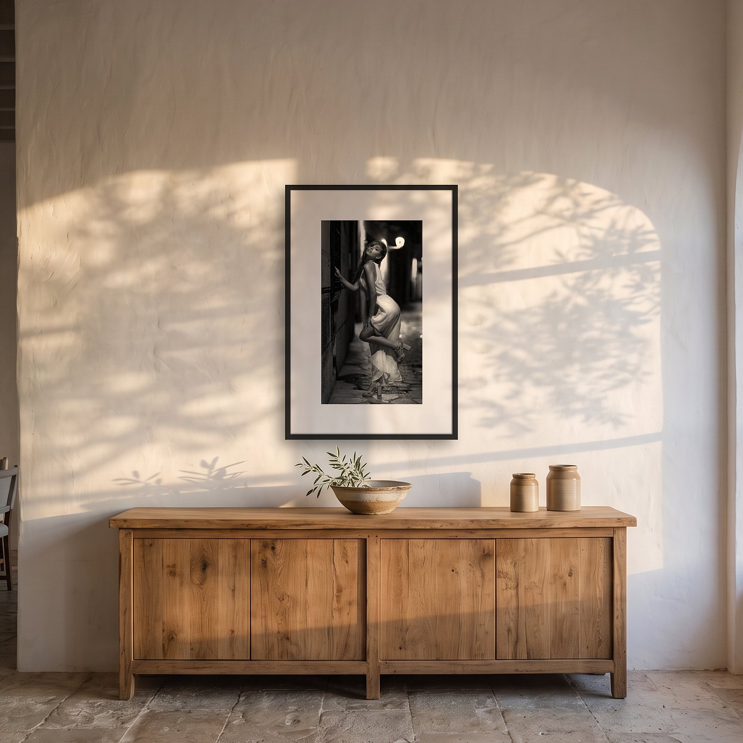 Palma nights 2 Palma nights – black & white fine art print by Marcus Boéll, framed, shown in a dining room
