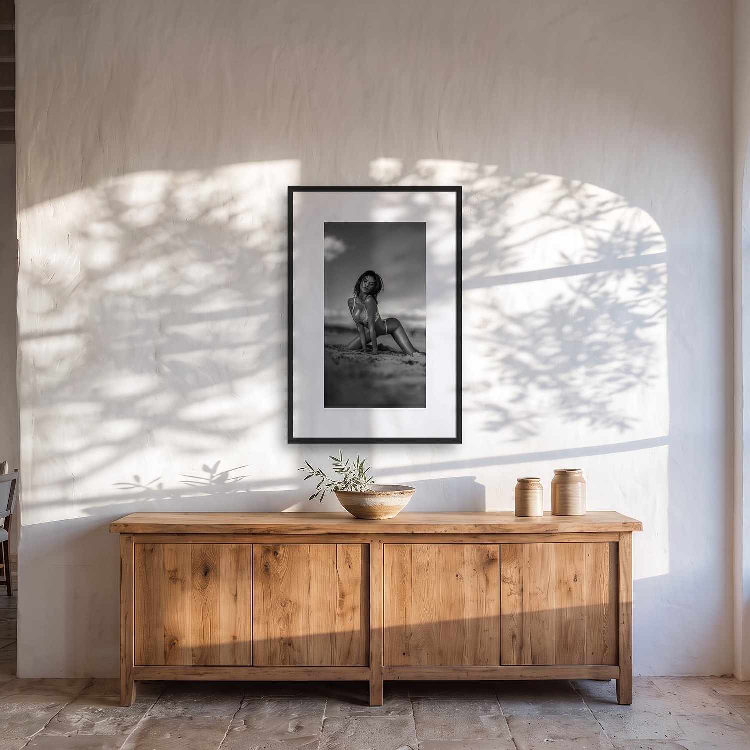 Son Moja – Portrait 2 Son Moja – black & white fine art print by Marcus Boéll, framed, shown in a dining room